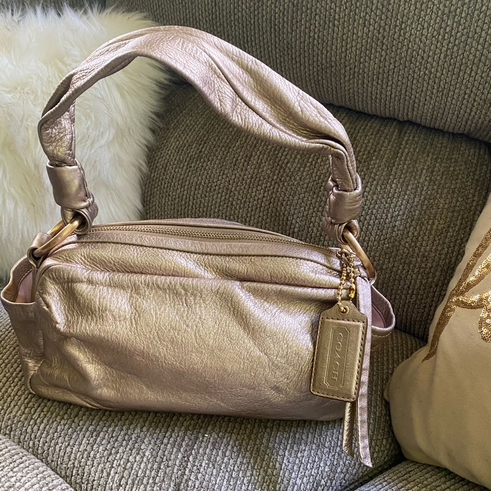 Authentic Coach small Rose Gold shoulder bag.